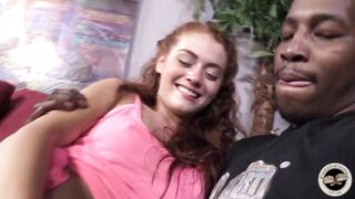 Alice Green is a lewd redhead who has a thing for interracial threesomes with black lads
