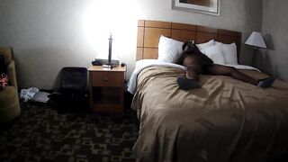 Big butt brunette is getting drilled from the back, by a black chap, in a hotel room