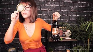 Velma is a lewd honey with red hair and glasses, who likes to play with her fuckholes