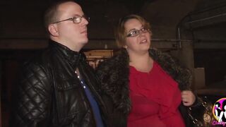 Fat redhead with glasses and big titties is having gangbang with lads she likes