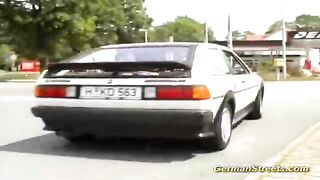 Slender, German brunette with natural tits is having a casual 3-some with two random men