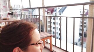 "Do you think anyone is watching? - Public balcony oral-sex