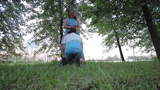 A couple, in plain sight, engaged in extraordinary sex in a clearing near the road