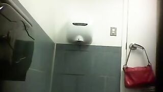 Woman squatting over throne-room and pissing