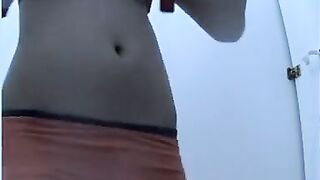 Angel spied in beach cabin changing