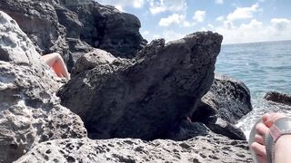 Beautiful readhed drilled on the beach between the rocks