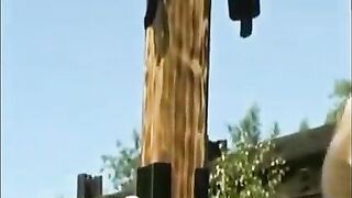 blonde whipped at a post