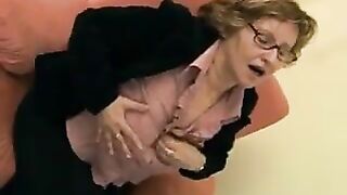 Big tit mature goes wild