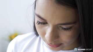 Emma Anturin is a slim Colombian teen who reads a porno